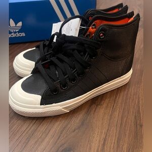 Adidas men’s Nizza Hi RF. Mens shoes size 5. Or women’s size 7. New